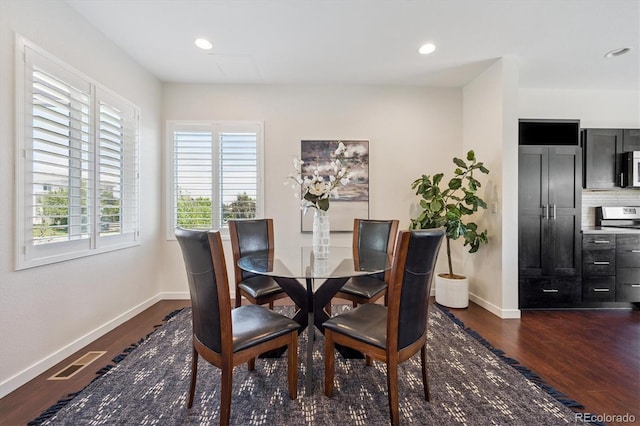 10844 Telluride St, Commerce City, CO 80022 - dining area featuring dark wood-style floors and recessed lighting