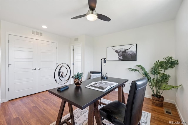 10844 Telluride St, Commerce City, CO 80022 - office area with wood finished floors, ceiling fan, and recessed lighting