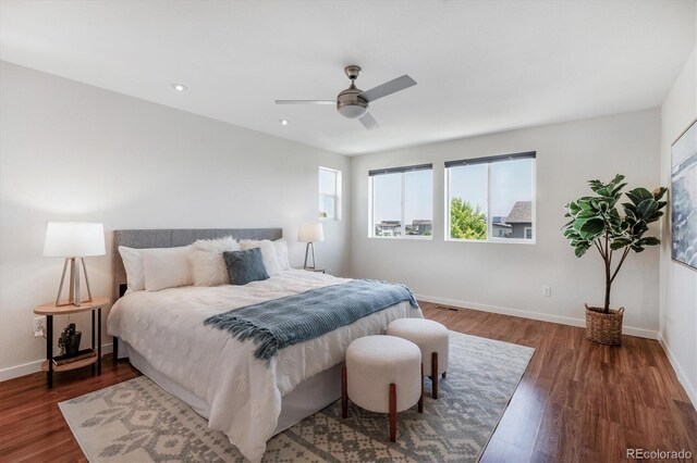 10844 Telluride St, Commerce City, CO 80022 - bedroom with wood finished floors, ceiling fan, and recessed lighting