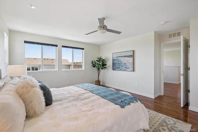 10844 Telluride St, Commerce City, CO 80022 - bedroom featuring wood finished floors and a ceiling fan