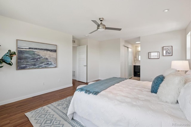 10844 Telluride St, Commerce City, CO 80022 - bedroom with wood finished floors, recessed lighting, connected bathroom, and a ceiling fan