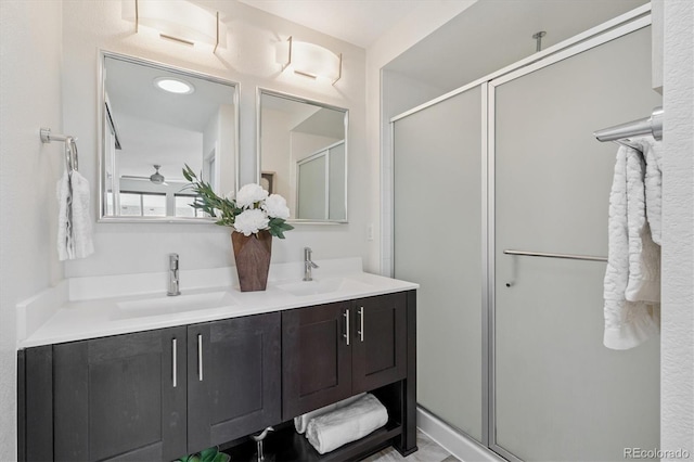 10844 Telluride St, Commerce City, CO 80022 - full bath featuring double vanity and a stall shower