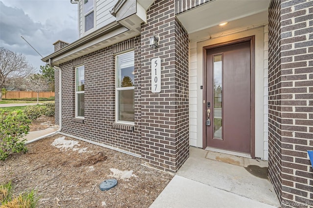 5107 S Fairplay St, Aurora, CO 80015 - property entrance featuring brick siding