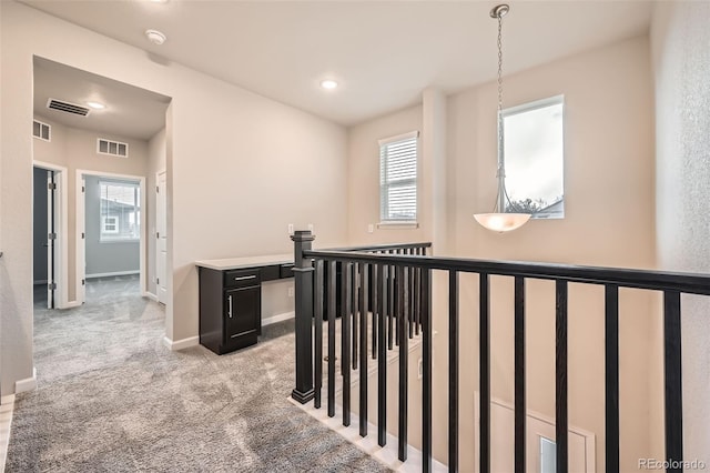 5107 S Fairplay St, Aurora, CO 80015 - hallway featuring healthy amount of natural light, carpet flooring, baseboards, and recessed lighting