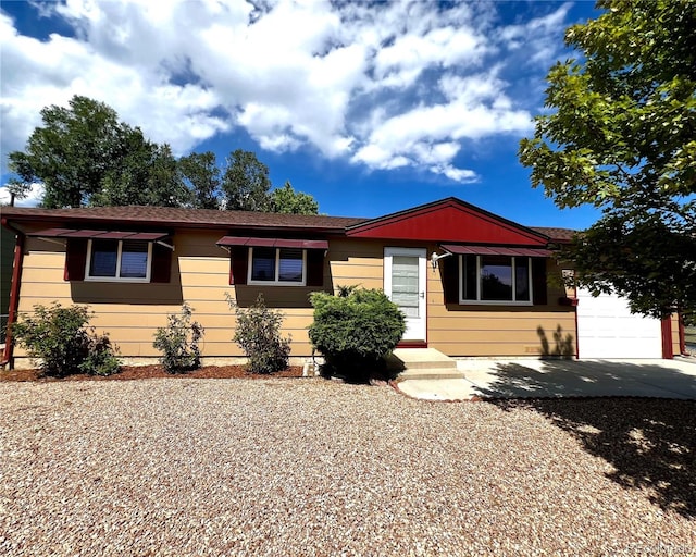 single story home with a garage