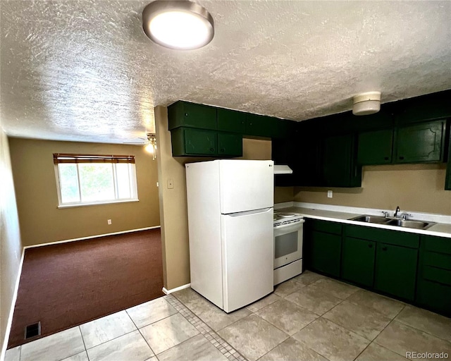 kitchen featuring a textured ceiling, white appliances, ventilation hood, sink, and green cabinets