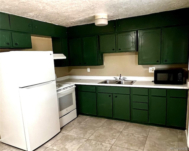 kitchen featuring a textured ceiling, sink, white appliances, and green cabinetry