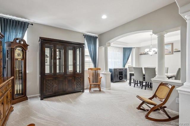 2810 Shadow Dance Dr, Castle Rock, CO 80109 - entrance foyer featuring decorative columns, plenty of natural light, light carpet, and recessed lighting