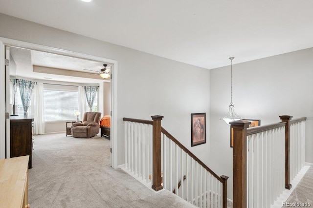 2810 Shadow Dance Dr, Castle Rock, CO 80109 - hall with an upstairs landing, light carpet, and baseboards