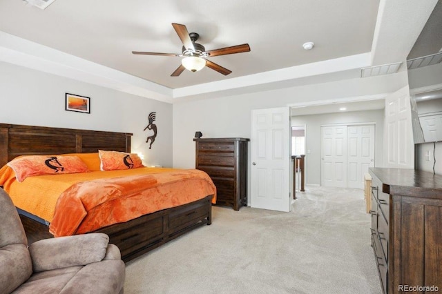 2810 Shadow Dance Dr, Castle Rock, CO 80109 - bedroom with a tray ceiling, light carpet, ceiling fan, and baseboards