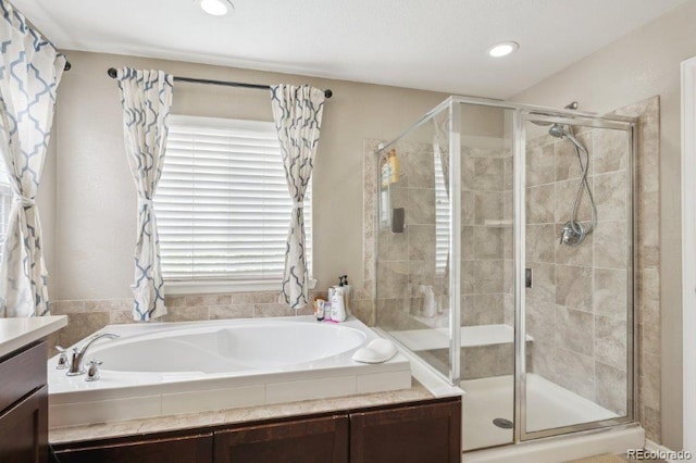 2810 Shadow Dance Dr, Castle Rock, CO 80109 - full bath with a stall shower, a bath, vanity, and recessed lighting
