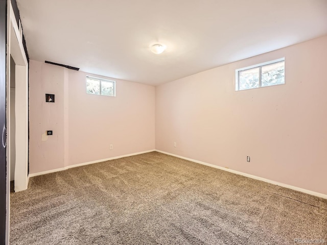 basement with carpet and plenty of natural light