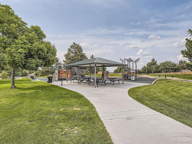 view of home's community with a gazebo and a yard