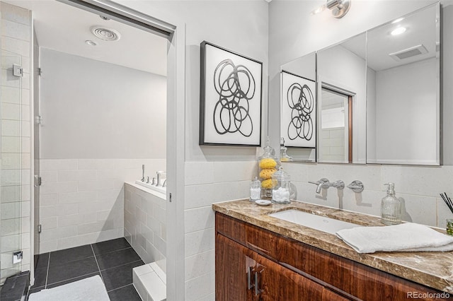 1863 Wazee St Unit 4E, Denver, CO 80202 - bathroom featuring vanity, tile patterned floors, and a bath