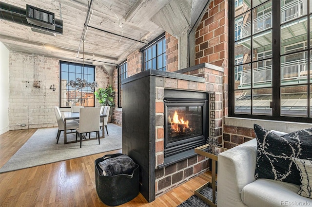 1863 Wazee St Unit 4E, Denver, CO 80202 - view of patio / terrace with a glass covered fireplace and outdoor dining area