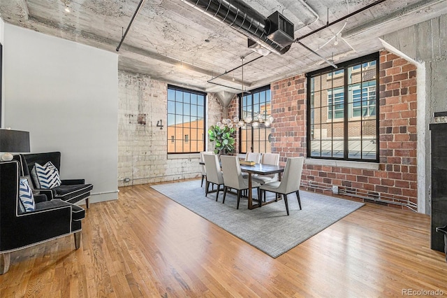 1863 Wazee St Unit 4E, Denver, CO 80202 - dining area with wood finished floors and healthy amount of natural light