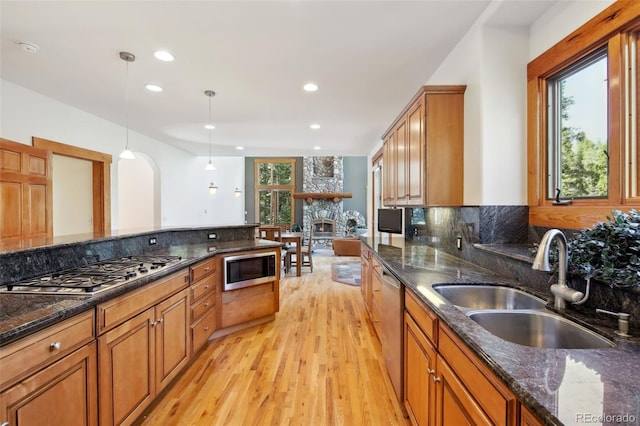 30 Carroll Ct, Black Hawk, CO 80422 - kitchen featuring a sink, light wood finished floors, appliances with stainless steel finishes, healthy amount of natural light, and recessed lighting
