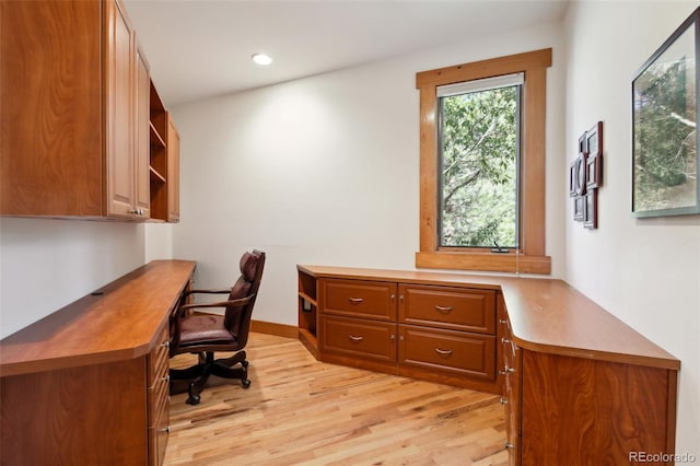 30 Carroll Ct, Black Hawk, CO 80422 - home office with light wood-style flooring, built in desk, and recessed lighting