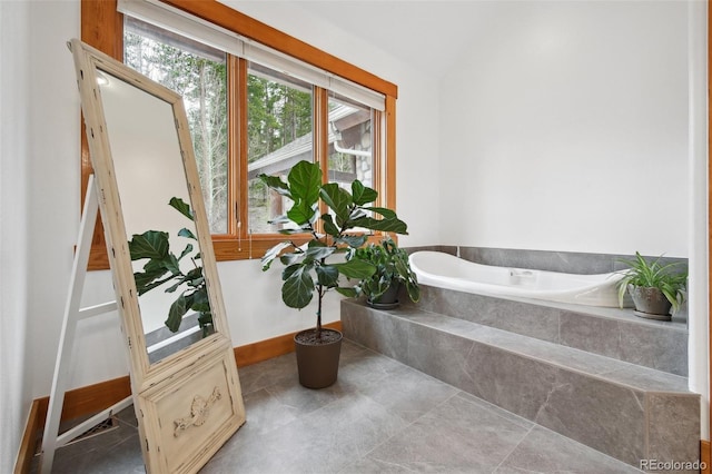 30 Carroll Ct, Black Hawk, CO 80422 - full bathroom with a garden tub and baseboards