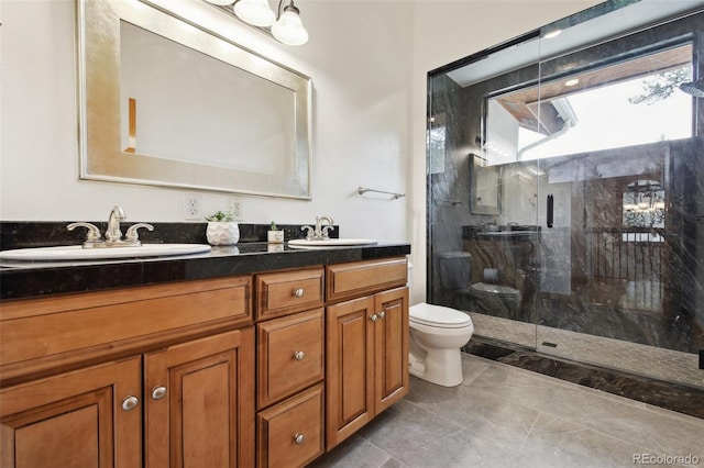 30 Carroll Ct, Black Hawk, CO 80422 - full bath with a marble finish shower, toilet, and double vanity