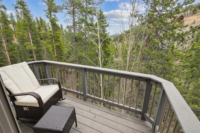 30 Carroll Ct, Black Hawk, CO 80422 - wooden deck featuring a forest view