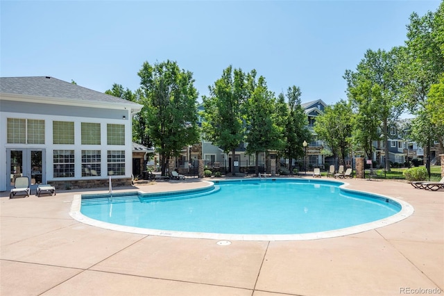 5255 Memphis St Unit 811, Denver, CO 80239 - community pool featuring a patio area