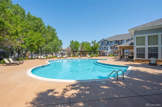 5255 Memphis St Unit 811, Denver, CO 80239 - community pool with a patio area and a residential view