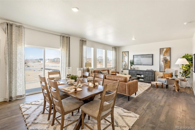 27664 E Byers Ave, Aurora, CO 80018 - dining space with wood finished floors, recessed lighting, and baseboards