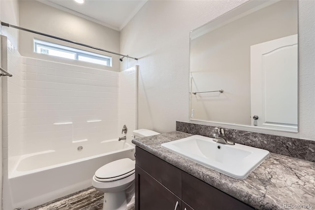 full bathroom featuring vanity, bathing tub / shower combination, crown molding, toilet, and wood-type flooring