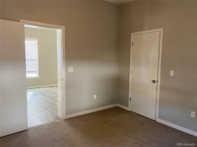 empty room featuring carpet floors