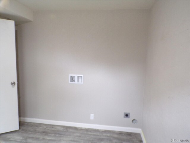 laundry area featuring hookup for an electric dryer, washer hookup, and hardwood / wood-style flooring