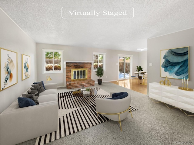 carpeted living area with a brick fireplace, a wealth of natural light, and a textured ceiling