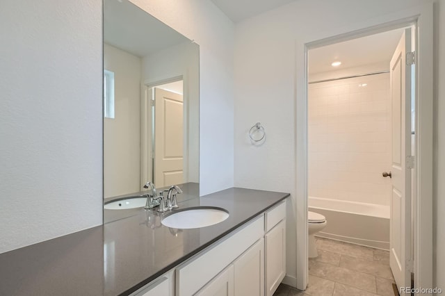 7357 S Yank Ct, Littleton, CO 80127 - full bathroom with toilet, vanity, tile patterned floors, and  shower combination