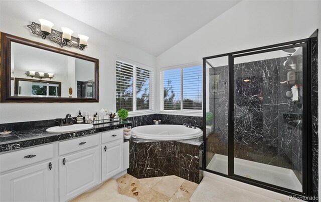 10383 Erin Pl, Lone Tree, CO 80124 - bathroom with vanity, marble finish floor, a bath, a marble finish shower, and vaulted ceiling