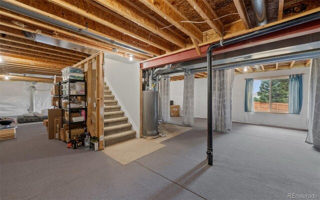 10383 Erin Pl, Lone Tree, CO 80124 - below grade area with gas water heater and stairway