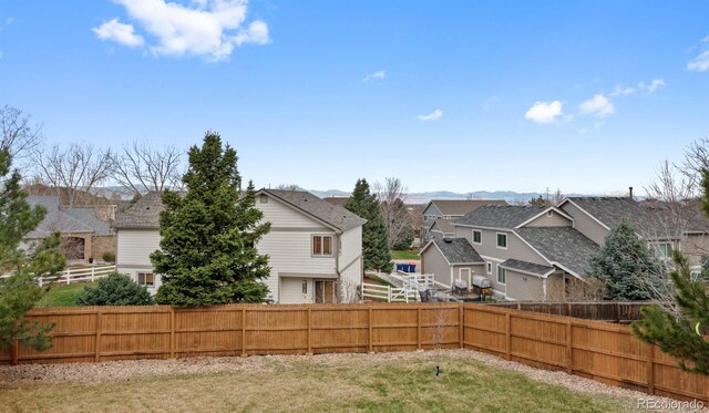 10383 Erin Pl, Lone Tree, CO 80124 - view of yard with a fenced backyard and a residential view