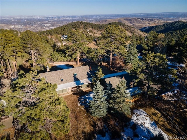 bird's eye view featuring a forest view