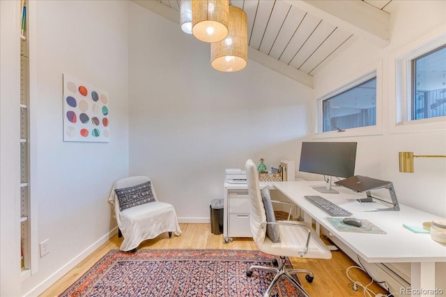 office featuring vaulted ceiling with beams, wood finished floors, and baseboards