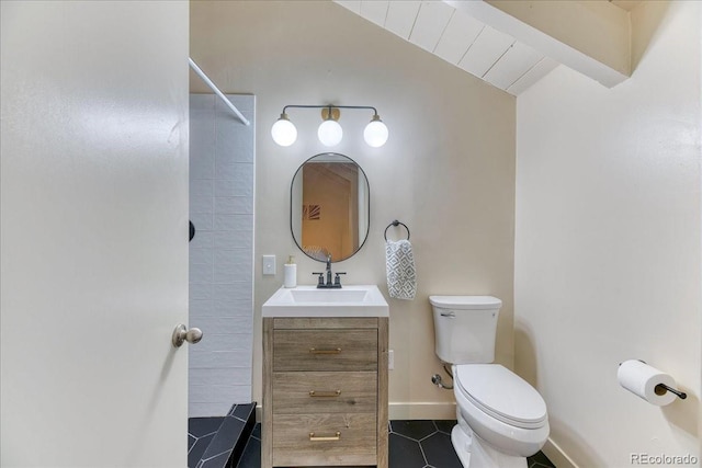 full bath with baseboards, toilet, lofted ceiling, walk in shower, and vanity