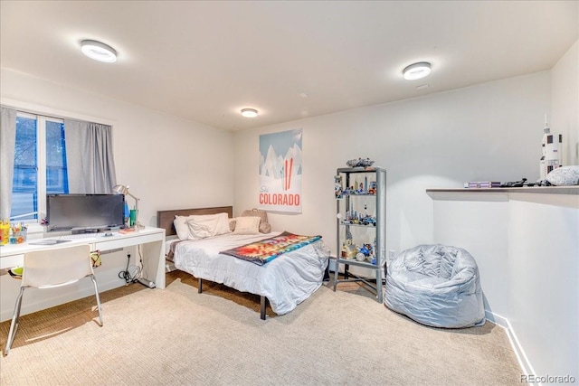 bedroom featuring baseboards