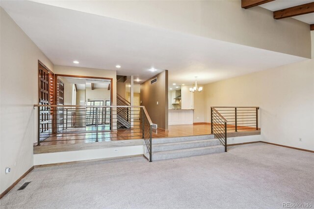 2609 S Quebec St S Unit 20, Denver, CO 80231 - stairway featuring carpet, a chandelier, baseboards, and recessed lighting