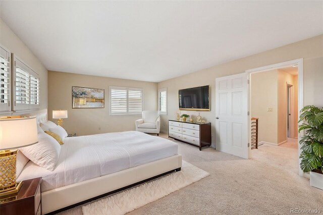 2609 S Quebec St S Unit 20, Denver, CO 80231 - bedroom featuring carpet