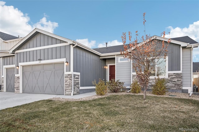 view of front facade with a front lawn and a garage