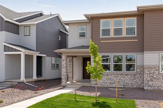 1415 Great Western Dr, Longmont, CO 80501 - view of front facade featuring stone siding