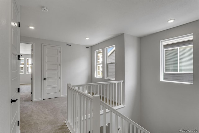 1415 Great Western Dr, Longmont, CO 80501 - corridor with carpet, an upstairs landing, recessed lighting, and baseboards