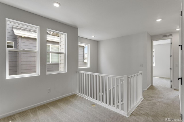 1415 Great Western Dr, Longmont, CO 80501 - hall with an upstairs landing, carpet, baseboards, and recessed lighting