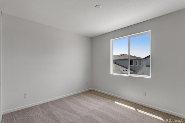 1415 Great Western Dr, Longmont, CO 80501 - carpeted spare room with baseboards