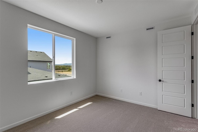 1415 Great Western Dr, Longmont, CO 80501 - spare room with carpet floors and baseboards