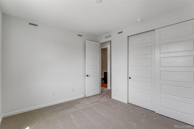 1415 Great Western Dr, Longmont, CO 80501 - unfurnished bedroom featuring light carpet, baseboards, and a closet