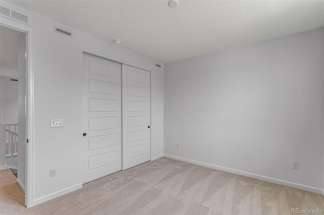 1415 Great Western Dr, Longmont, CO 80501 - unfurnished bedroom with carpet floors, a closet, and baseboards